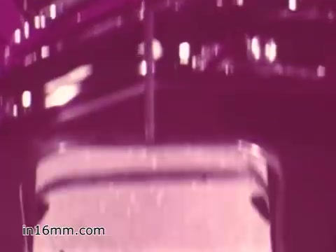 The 16mm still from the 'West Virginia Safety Council PSA' prominently features a vehicle close-up, likely emphasizing safety inspection elements. The colors appear muted, hinting at the vintage film quality typical of the 1960s. This PSA aims to raise awareness about vehicle safety and the importance of regular inspections. The focus on the vehicle suggests a message geared toward promoting safe driving practices within the community.