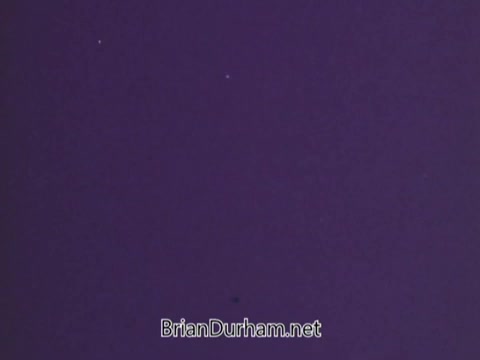 The still from the 'Juvenile Diabetes Foundation PSA' is dominated by a deep purple background with a few small white specks scattered across it. The overall appearance is abstract and minimalistic, potentially reflecting a theme related to awareness or a medical condition. The text at the bottom identifies the source.