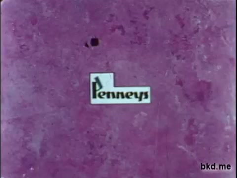The still features a logo for 'Penney's' displayed against a textured pink background. The logo is prominently positioned and rendered in a simple, bold font, typical of advertisements from the mid-20th century. The overall aesthetic is reflective of vintage commercial print styles.